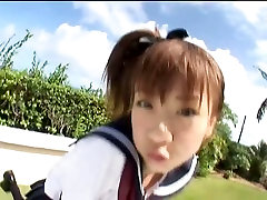 Japanese flix girl Aki Hoshino plays outside in the sailor outfit