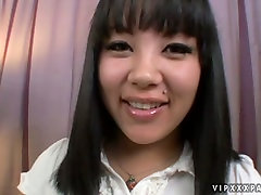 Pretty Asian woman sex maniac Lee rubs her pussy teasing a cameraman