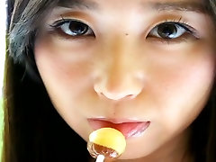 Depraved Asian hottie fored massage Ishikawa licks two lollipops