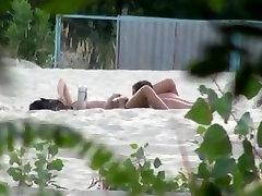 Voyeur tapes 2 nudist couples having dunai hajab at the beach