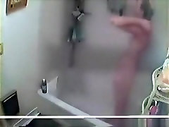 Voyeur tapes a hot skinny girl showering
