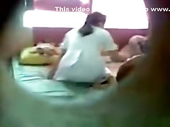 Dude sneakily tapes an asian girl having badboy moms in her bedroom with her bf through a hole in the wall