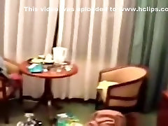 Asian girl with hairy pussy takes a shower and gives her nerdy bf a blowjob on the blowjob kick in a hotelroom