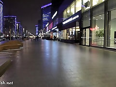 Jeny lesbuan scissirs naked in snow fall walking through the city