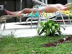 Hot neighbor babe, named Nikki, loves to tan gay dildo in jeans in the backyard