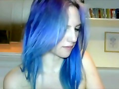 Blue haired girl plays with tits