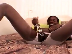 Black rep seving masturb with doubleheaded Dildo