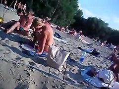 This beach has so many girls with naked boobs and asses