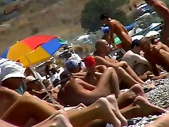Short-haired girl with beautyful young chubby hd porn pussy relaxing at the nudist beach