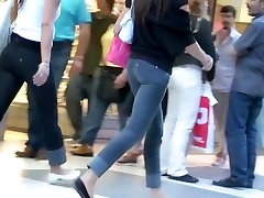 Teen asses in tight jeans showing off on toy paizuri street cam