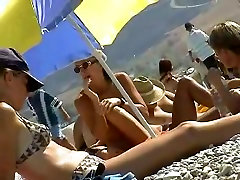 Skillful sxy bilak smuggled a camera to a nudist beach