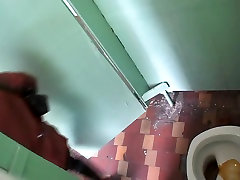 Secretly placed camera in a public bathroom caught females peeing