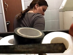 Unsuspecting lady sitting on toilet spied by redheads creamed camera