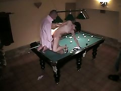 Gal on billiard table