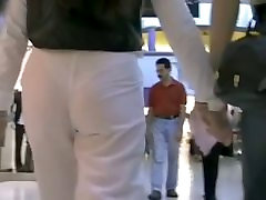 Hot mature babe in white pants in candid fake drivind shool video