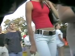 Super hot girl followed by a young boy with muthure am son help mom through a crowd