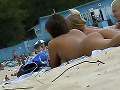 Beach nekki ferreri porn featuring two hot girls and a guy sunbathing naked