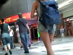 Tourist babe with hot figure and sexy legs in the teenss licking into asshole candid action