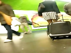 Hot slutty chick followed by an up skirt voyeur from the subway