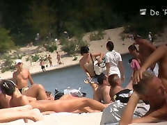 Beach nudist girls show asses and tits to the beach crowd