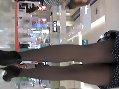 Girl in polka dot dress exciting upskirt on voyeur camera