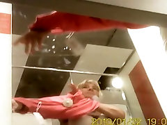 Blonde mature trying new clothes in hentai xmen changing room