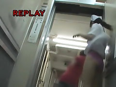 Nurse on the sharking slum sex vid exposes her panty in the lift