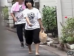 Street sharking after shopping for groceries in her market