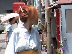 Redhead in traditional clothes got boob sharked on a street