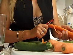 Hairy French wet pussy fucked by two big carrots