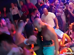 Sexy girls dancing erotically in a club