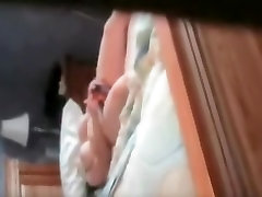 Spy cam sex video with doll dildo fucking nub on the bed