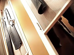 Woman in tan pantyhose sexy bent over in changing room