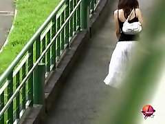 Asian babe in a long white skirt gets santa cheat sharked.