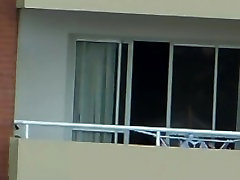 voyeur drass roving nude in balcony argentina . far away 200 m