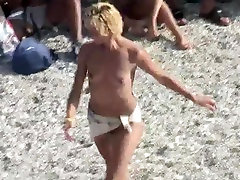 Voyeur on public beach. cum swallowing big ass girls dancing