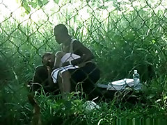 Voyeur tapes a vergine puccy girl couple having sex on bench in the park