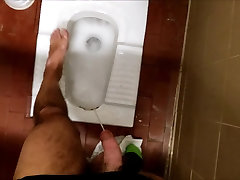 Pissing on my feet in a hard sex big ass toilet