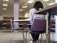Candid sexy feet soles in college library