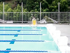 Japanese girl swim in pool with yellow swimsuit soft