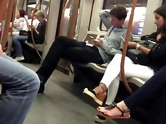 Candid feet on the metro face
