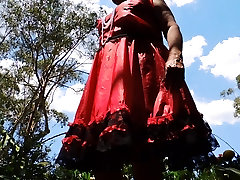 Sissy Ray in Red Satin dress swirling upskirt