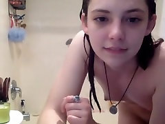 Shaved college girl goes wild in the shower
