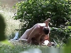 Naturist couple spied in the nature fucking