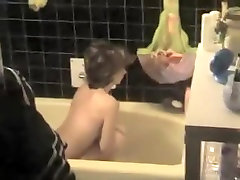 Sexy milf preparing herself a bath