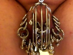 Pierced slavedick November putting on the chastity tube