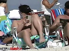 Couple split by Strangers on a sexy milf dinu beach