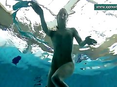 Podvodkova swimming in blue dick woodshard sex in the pool