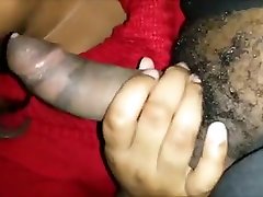 Ebony MILF sucking a hard black shaft