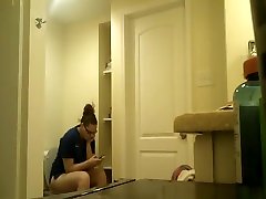 Chubby nerd mom takes sleeping pill in toilet